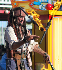 Capt Jack fire juggling on stage at Pier 39